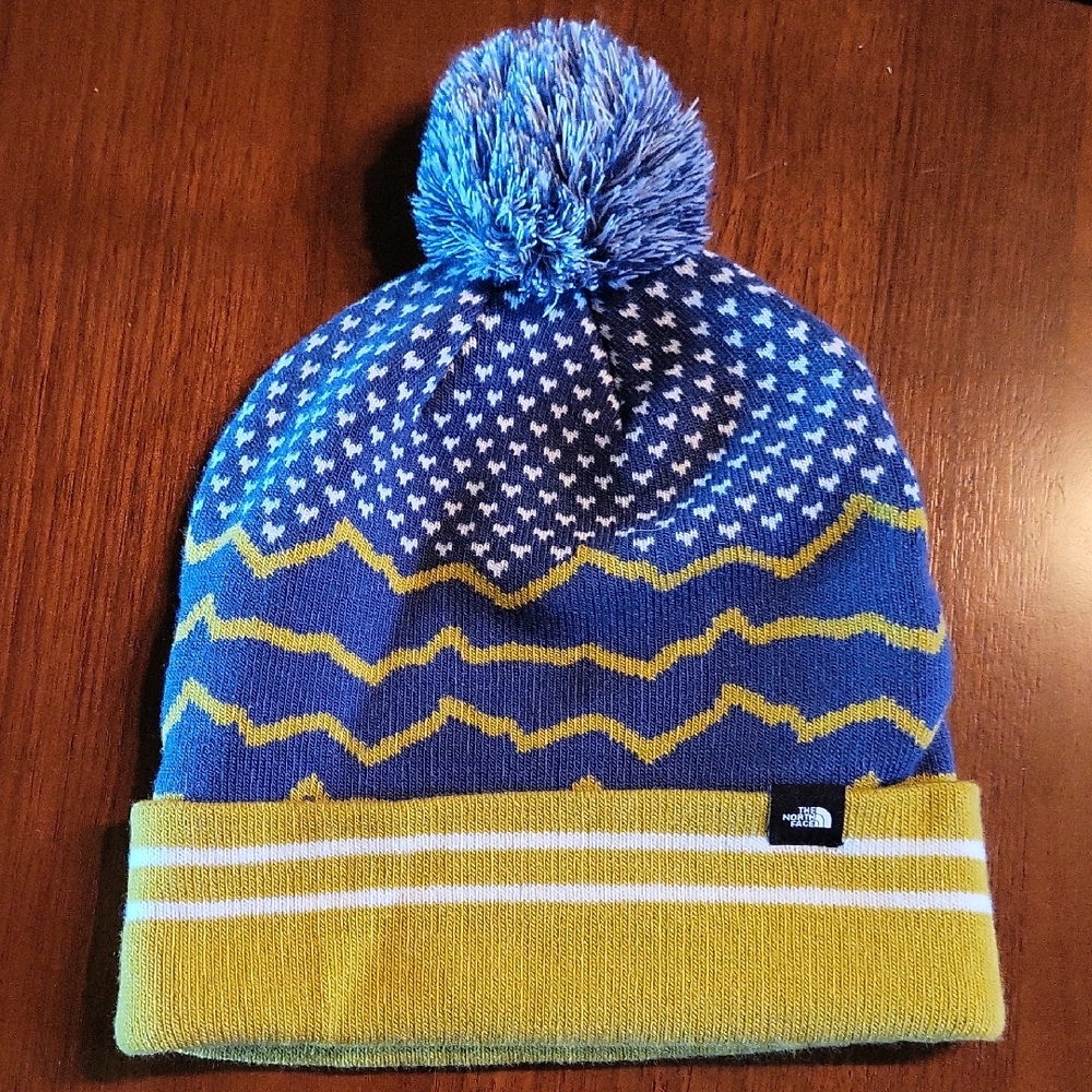Blue and Yellow North Face Beanie